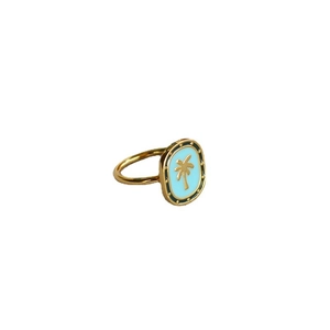 Vintage gold ring with blue enamel and palm tree design for a tropical summer vacation look