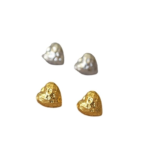 Minimalist hammered texture heart-shaped stud earrings in gold and silver finish