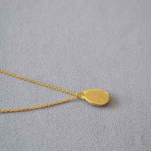 French vintage gold twist chain necklace with a smooth oval embossed mirror pendant