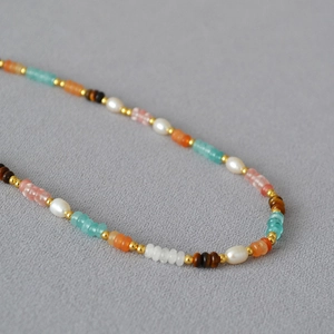 Minimalist pearl necklace with colorful semi-precious gemstones and golden spacer beads
