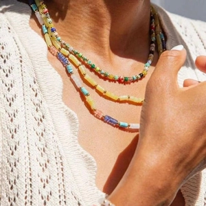 Bohemian multi-layer necklace with colorful gemstone beads and gold spherical spacers