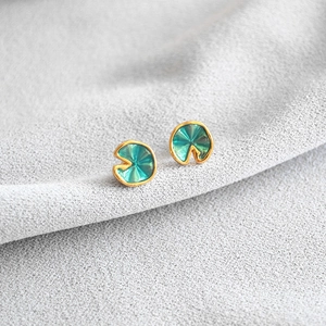 Elegant green enamel lotus leaf stud earrings with 925 silver needles and gold frame