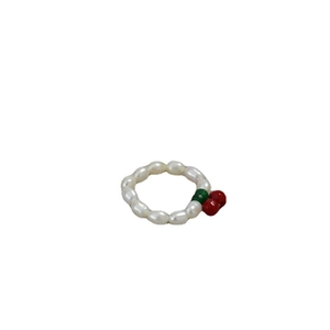 Minimalist elastic ring with white freshwater pearls and red cherry charm accent