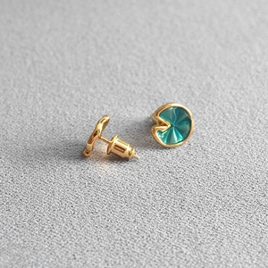 Elegant gold lotus leaf earrings with green enamel inlay and 925 silver needles