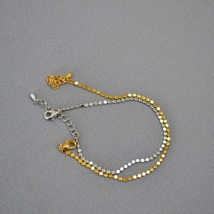 Minimalist shiny round disc bracelets in gold and silver finish with lobster clasp