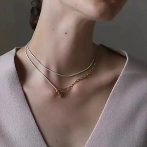 Minimalist dual-layer silver and gold chain necklace with T-bar clasp for women