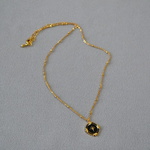 French style gold plated necklace with black enamel oval North Star pendant on bead chain