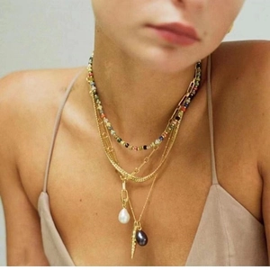 Colorful gemstone bead and gold bean layered necklace with white and black pearl pendants