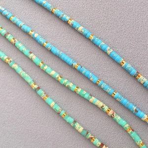 Retro beaded necklaces with turquoise stones and gold spacers in a coastal style