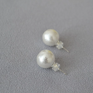 Detailed close-up of vintage faux pearl earrings with 925 silver needles and silicone backs
