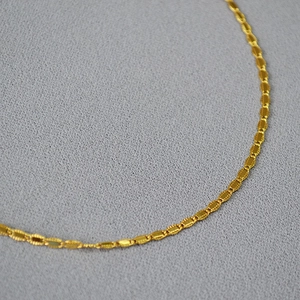 French retro gold plated lace texture chain necklace shown in a detailed close-up shot