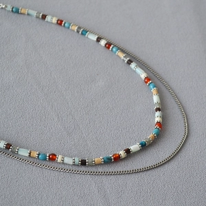 Double-layered bohemian necklace with multicolor mixed beads and slim silver metal chain