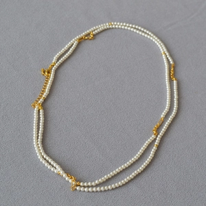 French style double-layer pearl necklace with gold metal chains and elegant clasp