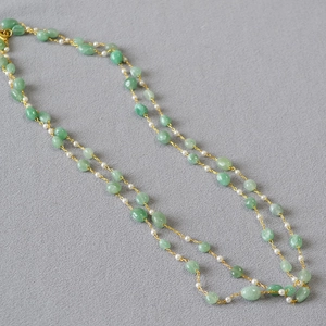 Double-layer long sweater necklace featuring green natural stone beads and small white pearls
