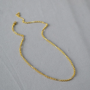 Elegant gold plated interlocking circle chain necklace with a heart charm extender