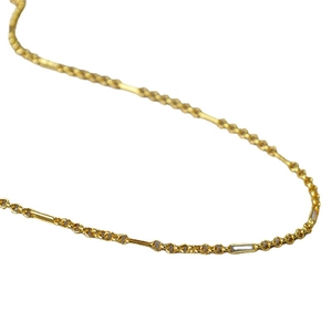 French minimalist gold-plated brass chain with interlocking round links and tubes