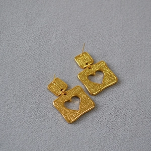 Retro hollow heart square earrings in gold-plated finish with textured hammered metal surface