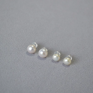 Elegant 925 silver studs with white and pink freshwater pearls and silicone backs