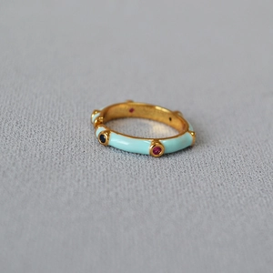 Bamboo-style gold ring with light blue enamel and colored zircon accents