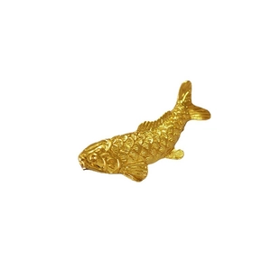 Vintage gold-plated koi fish brooch with detailed scales and a vibrant golden finish