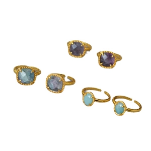 Set of retro golden open rings featuring faceted multi-color fluorite and square gemstones