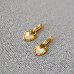 French retro gold plated heart earrings with white shell inlay and radiant textures