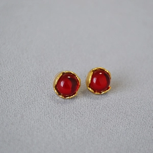 French vintage gold earrings with red round gemstone set in irregular metal frame