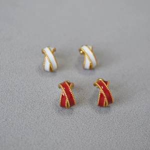 Retro enamel crossover stud earrings set in red and white with gold beaded edges