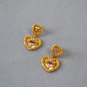 Vintage gold-plated twisted rope earrings featuring light pink zircon heart-shaped stones