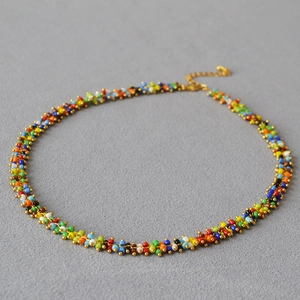 Bohemian multilayer colorful seed bead necklace with gold spacers and adjustable clasp