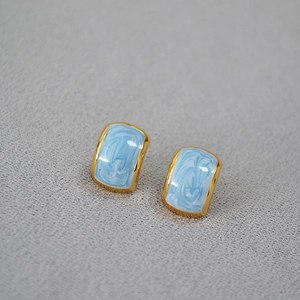 Minimalist geometric gold-plated earrings with light blue marble enamel and 925 silver pins