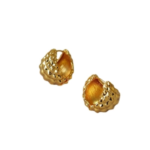 Chunky gold-plated hoop earrings featuring a three-dimensional embossed pineapple pattern