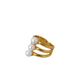 Three-layer gold-plated brass ring with artificial pearl accents in a minimalist design