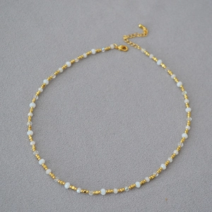 Minimalist handmade beaded brass gold plated necklace with white beads for women