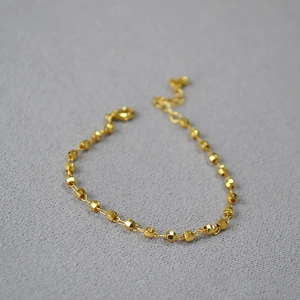 Sparkling gold faceted laser beads bracelet with lobster clasp and adjustable chain