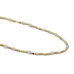 Handmade beaded necklace with gold brass beads and faceted light blue crystal accents