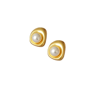Baroque style gold-plated earrings with round pearls and matte textured organic metal design