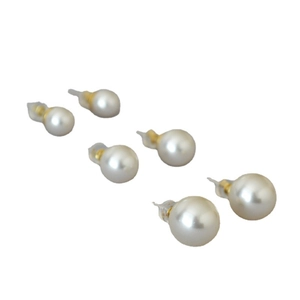 Three pairs of white round pearl stud earrings in varying sizes with golden needles