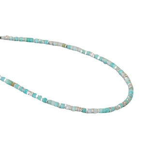 Amazonite necklace with silver irregular beads on a clean white background