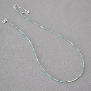 Faceted aquamarine gemstone beaded necklace with silver spacer beads and lobster clasp