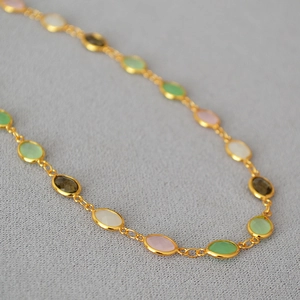Elegant gold-plated brass necklace with multi-color faceted oval crystal glass gems