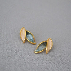 Elegant gold-plated leaf stud earrings with peach pink and marble blue enamel finish