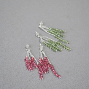 Detail of beaded tassel earrings with crystal clusters and 925 silver needles