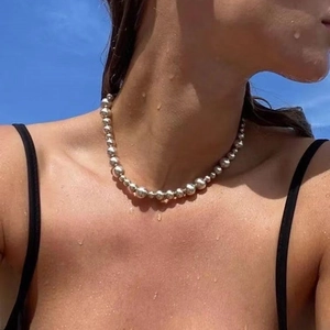 Polished silver bead choker necklace for women with reflective spherical metallic balls