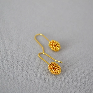 Elegant gold-plated brass earrings featuring realistic pine cone charms on ear hooks