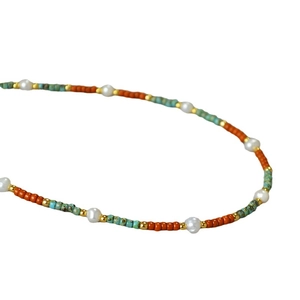 Handmade freshwater pearl and colorful glass bead necklace in bohemian minimalist style