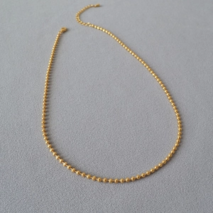 Minimalist gold-plated brass ball chain necklace with adjustable lobster clasp closure