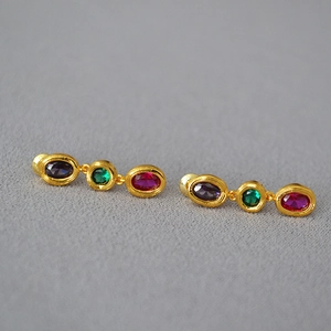 Elegant gold-plated brass stud earrings featuring a trio of colorful gemstones