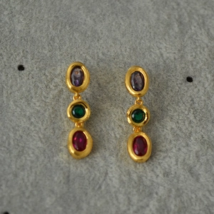 Vintage gold-plated earrings with three-tiered colorful oval gemstones in vertical design