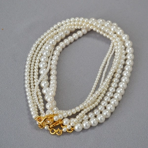 Multi-layered French style pearl necklace set with elegant golden clasp for women